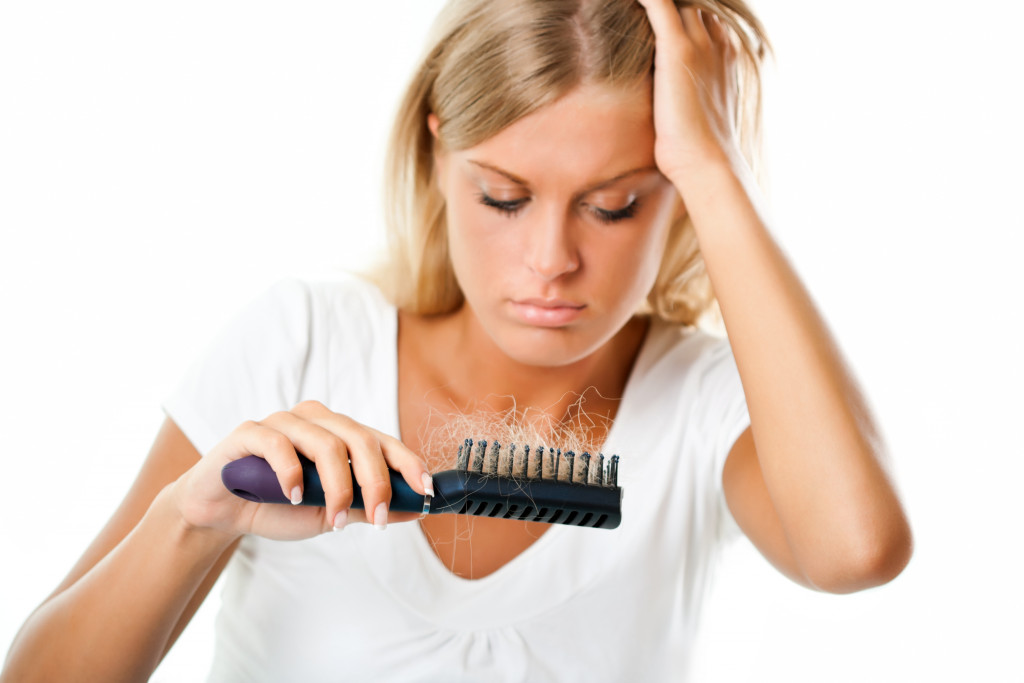 girl having Hair loss